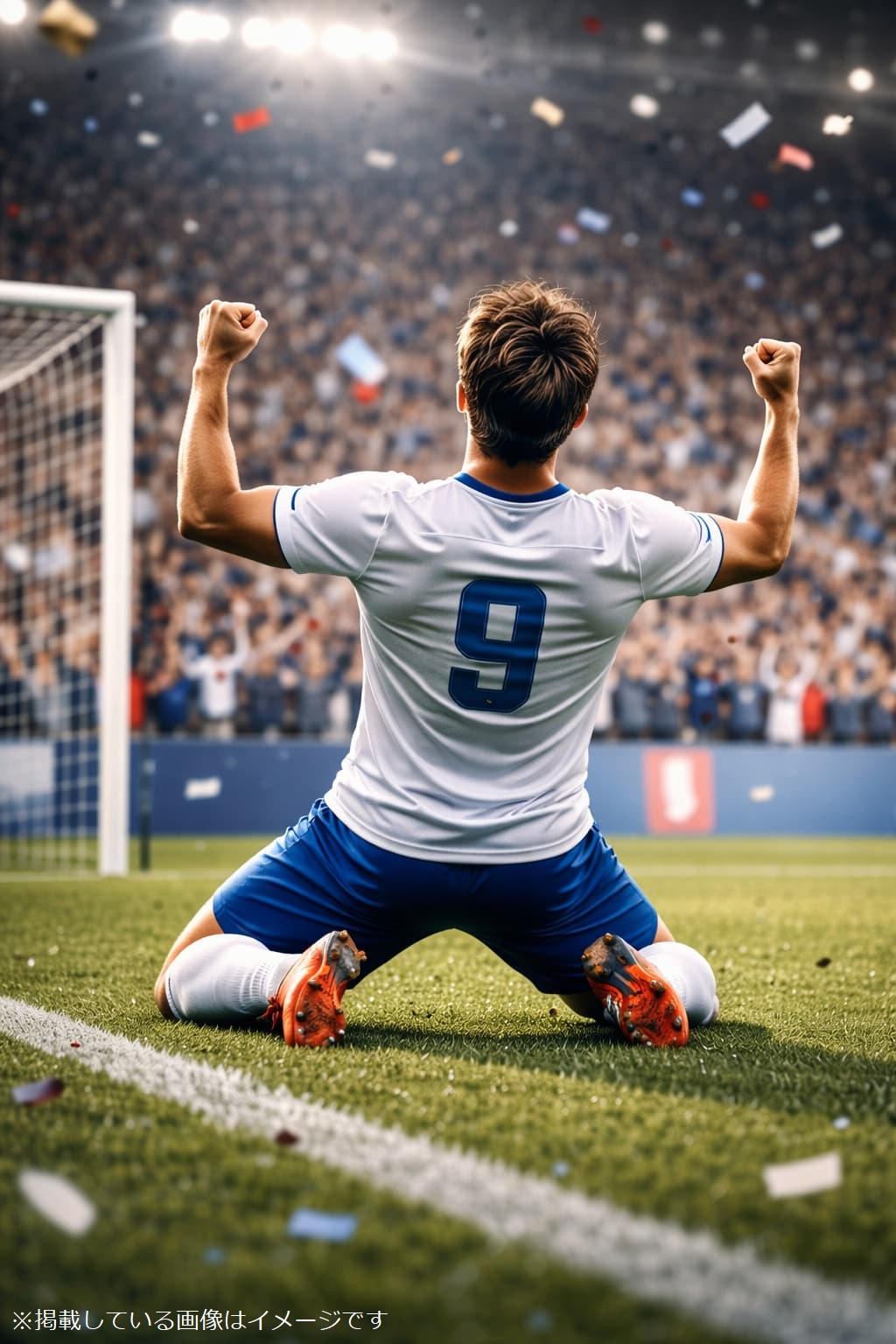 サッカースタジアムでガッツポーズをする選手の後ろ姿と、熱狂する観客のイメージ